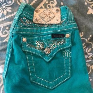Lightly worn turquoise skinny miss me jeans!